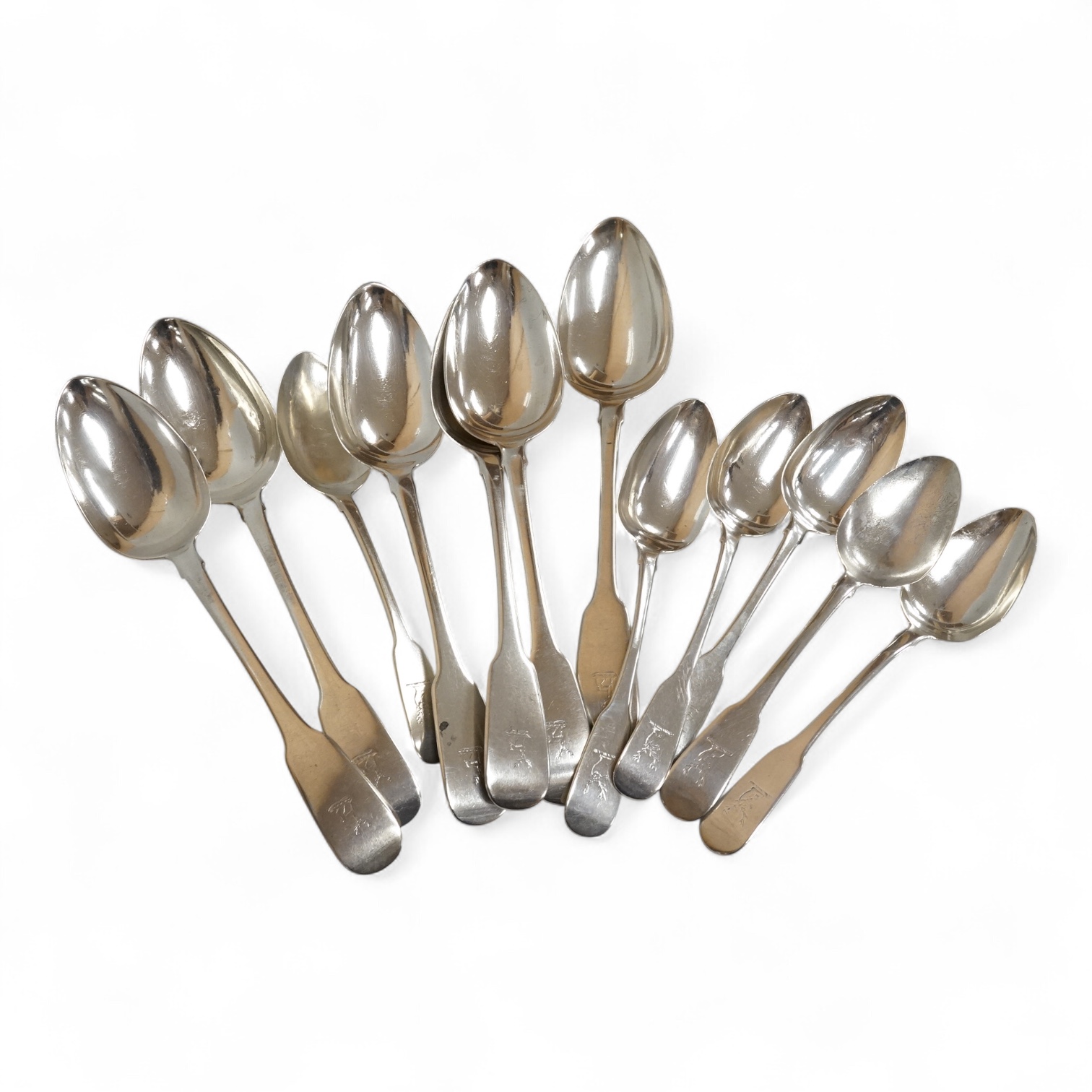 A set of six late George III Irish silver fiddle pattern table spoons and six matching dessert spoons, Philip Weekes, Dublin, 1818, 20.6oz.